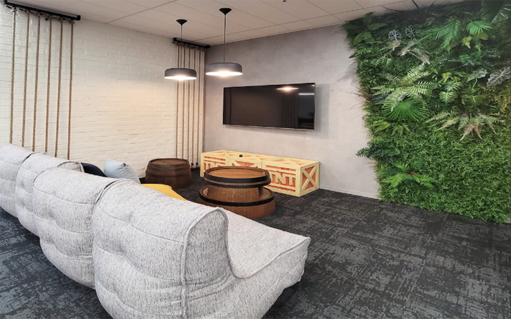 Proper lighting can enhance the mood of a gym in a commercial design and build project.